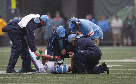 EAST RUTHERFORD, NJ - SEPTEMBER 27: Vincent Fuller #22 of the Tennessee Titans lays injured on the ground after he put a hit on a New York Jets player during the game on September 27, 2009 at Giants Stadium in East Rutherford, New Jersey. <br /><br /><span class="help">(Photo by Jared Wickerham/Getty Images)</span>