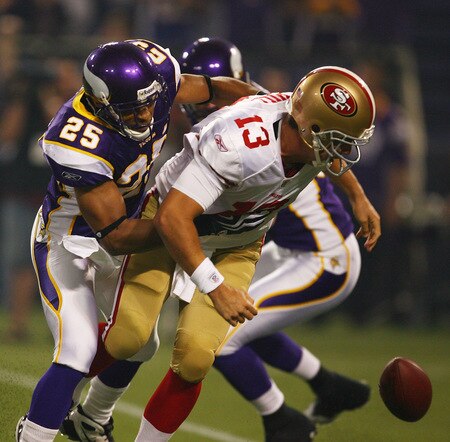MINNEAPOLIS - SEPTEMBER 27: Shaun Hill #13 of the San Francisco 49ers tries to recover a loose ball as Tyrell Johnson #25 of the Minnesota Vikings pulls him down at the Hubert H. Humphrey Metrodome on September 27, 2009 in Minneapolis, Minnesota. The Vikings defeated the 49ers 27-24. <br /><br /><span class="help">(Photo by Jonathan Daniel/Getty Images)</span>