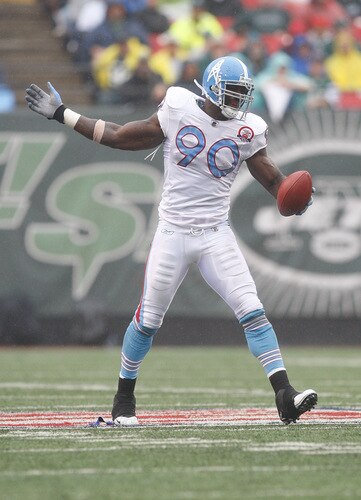 EAST RUTHERFORD, NJ - SEPTEMBER 27: Jevon Kearse #90 of the Tennessee Titans celebrates after he recovered a fumble against the New York Jets during the game on September 27, 2009 at Giants Stadium in East Rutherford, New Jersey. <br /><br /><span class="help">(Photo by Jared Wickerham/Getty Images)</span>
