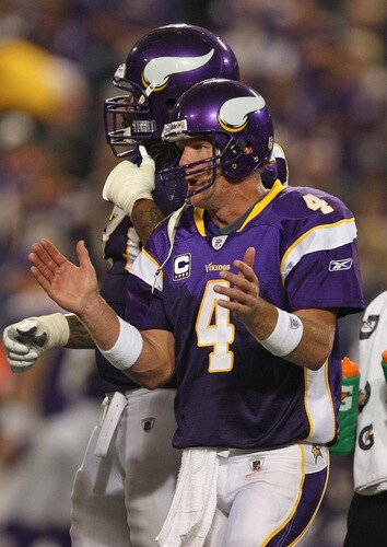 MINNEAPOLIS - SEPTEMBER 27: Brett Favre #4 of the Minnesota Vikings encourages his teammates in the huddle during the 4th quarter against the San Francisco 49ers at the Hubert H. Humphrey Metrodome on September 27, 2009 in Minneapolis, Minnesota. The Vikings defeated the 49ers 27-24. <br /><br /><span class="help">(Photo by Jonathan Daniel/Getty Images)</span>