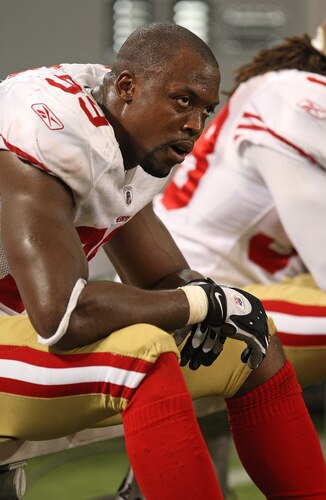 MINNEAPOLIS - SEPTEMBER 27: Manny Lawson #99 of the San Francisco 49ers sits on the bench at the end of a game against the Minnesota Vikings at the Hubert H. Humphrey Metrodome on September 27, 2009 in Minneapolis, Minnesota. The Vikings defeated the 49ers 27-24. <br /><br /><span class="help">(Photo by Jonathan Daniel/Getty Images)</span>