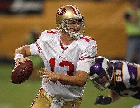 MINNEAPOLIS - SEPTEMBER 27: Shaun Hill #13 of the San Francisco 49ers rolls out to pass as Jared Allen #69 of the Minnesota Vikings chases him at the Hubert H. Humphrey Metrodome on September 27, 2009 in Minneapolis, Minnesota. The Vikings defeated the 49ers 27-24. <br /><br /><span class="help">(Photo by Jonathan Daniel/Getty Images)</span>