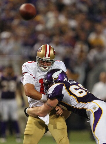 MINNEAPOLIS - SEPTEMBER 27: Jared Allen #69 of the Minnesota Vikings hits Shaun Hill #13 of the San Francisco 49ers in the chest after he passes the ball at the Hubert H. Humphrey Metrodome on September 27, 2009 in Minneapolis, Minnesota. The Vikings defeated the 49ers 27-24. <br /><br /><span class="help">(Photo by Jonathan Daniel/Getty Images)</span>