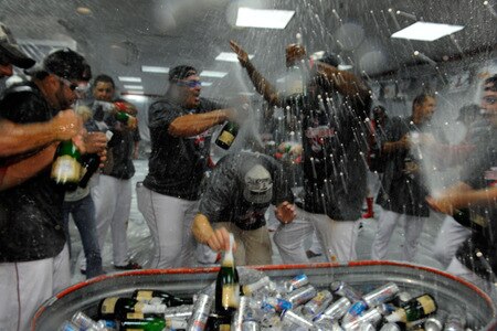 ANAHEIM, CA - SEPTEMBER 28: The Los Angeles Angels of Anaheim celebrate after winning the American League West title in their game against the Texas Rangers at Angel Stadium on September 28, 2009 in Anaheim, California.  <br /><br /><span class="help">(Photo by Kevork Djansezian/Getty Images)</span>