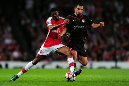 LONDON, ENGLAND - SEPTEMBER 29:  Abou Diaby of Arsenal battles for the ball with Ieroklis Stoltidis of Olympiakos during the UEFA Champions League Group H match between Arsenal and Olympiakos at the Emirates Stadium on September 29, 2009 in London, England.  <br /><br /><span class="help">(Photo by Mike Hewitt/Getty Images)</span>