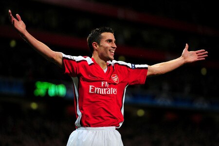 LONDON, ENGLAND - SEPTEMBER 29:  Robin van Persie of Arsenal celebrates after he scored the first goal during the UEFA Champions League Group H match between Arsenal and Olympiakos at the Emirates Stadium on September 29, 2009 in London, England.  <br /><br /><span class="help">(Photo by Mike Hewitt/Getty Images)</span>