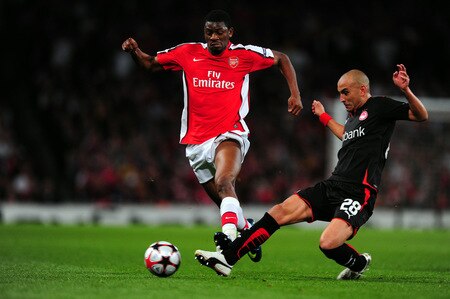 LONDON, ENGLAND - SEPTEMBER 29:  Abou Diaby of Arsenal battles for the ball with Cristian Ledesma of Olympiakos during the UEFA Champions League Group H match between Arsenal and Olympiakos at the Emirates Stadium on September 29, 2009 in London, England.  <br /><br /><span class="help">(Photo by Mike Hewitt/Getty Images)</span>
