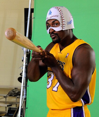 EL SEGUNDO, CA - SEPTEMBER 29: Ron Atrest #37 of the Los Angeles Lakers holds a baseball bat and wears a mask while taping a public announcement for the Los Angeles Dodgers during Lakers media day at the Lakers training facility on September 29, 2009 in El Segundo, California.  <br /><br /><span class="help">(Photo by Kevork Djansezian/Getty Images)</span>