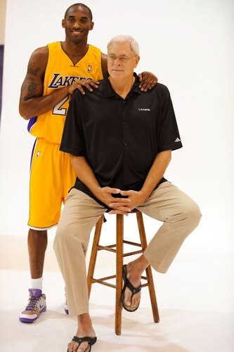 EL SEGUNDO, CA - SEPTEMBER 29:  Kobe Bryant #24 and Phil Jackson coach of the Los Angeles Lakers pose for a photograph during Lakers media day at their training facility on  September 29, 2009 in El Segundo, California. <br /><br /><span class="help">(Photo by Kevork Djansezian/Getty Images)</span>