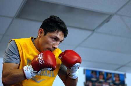 LOS ANGELES, CA - SEPTEMBER 29:  Israel Vasquez Two-time Junior Featherweight World Champion hits the mits with his trainer Rudy Perez during his workout session at Urbina Westside Boxing Gym on September 29, 2009 in Los Angeles, California. Vasquez will return to the ring to face Angel Priolo on October 10, 2009.  <br /><br /><span class="help">(Photo by Jacob de Golish/Getty Images)</span>