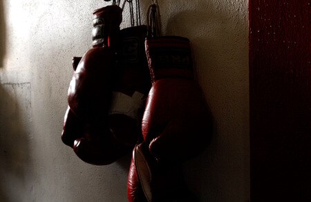 LOS ANGELES, CA - SEPTEMBER 29: Boxing gloves hang on the wall at the Urbina Westside Boxing Gym where Israel Vasquez Two-time Junior Featherweight World Champion had a workout session on September 29, 2009 in Los Angeles, California.  Vasquez will return to the ring to face Angel Priolo on October 10, 2009.  <br /><br /><span class="help">(Photo by Jacob de Golish/Getty Images)</span>