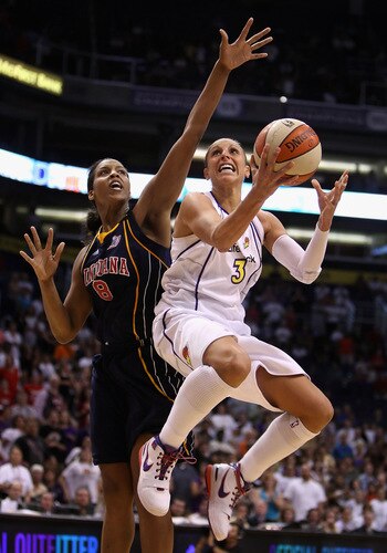 PHOENIX - SEPTEMBER 29:  Diana Taurasi #3 of the Phoenix Mercury lays up a shot past Tammy Sutton-Brown #8 of the Indiana Fever in Game One of the 2009 WNBA Finals at US Airways Center on August 29, 2009 in Phoenix, Arizona. The Mercury defeated the Fever 120-116 in overtime to take a 1-0 series lead. <br /><br /><span class="help">(Photo by Christian Petersen/Getty Images)</span>