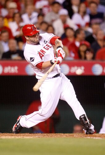 ANAHEIM, CA - SEPTEMBER 29:  Mike Napoli #44 of the Los Angeles Angels of Anaheim singles to center field scoring Brandon Wood and Chone Figgins in the fourth inning against the Texas Rangers at Angel Stadium on September 29, 2009 in Anaheim, California.  <br /><br /><span class="help">(Photo by Jeff Gross/Getty Images)</span>