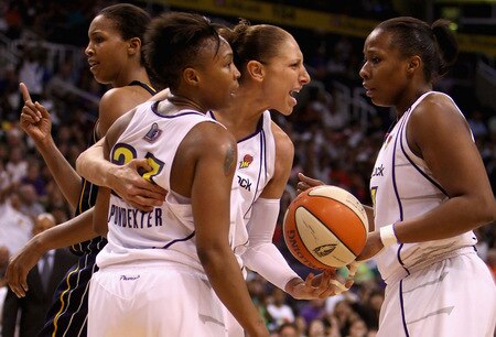 PHOENIX - SEPTEMBER 29:  Diana Taurasi #3 of the Phoenix Mercury reacts to teammates Cappie Pondexter #23 and Le'coe Willingham #43 after scoring against the Indiana Fever in Game One of the 2009 WNBA Finals at US Airways Center on August 29, 2009 in Phoenix, Arizona. The Mercury defeated the Fever 120-116 in overtime to take a 1-0 series lead. <br /><br /><span class="help">(Photo by Christian Petersen/Getty Images)</span>