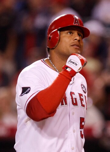 ANAHEIM, CA - SEPTEMBER 29:  Bobby Abreu #53 of the Los Angeles Angels of Anaheim pumps his fist after hitting a solo home run in the first inning against the Texas Rangers at Angel Stadium on September 29, 2009 in Anaheim, California. The Angels defeated the Rangers 5-2.  <br /><br /><span class="help">(Photo by Jeff Gross/Getty Images)</span>