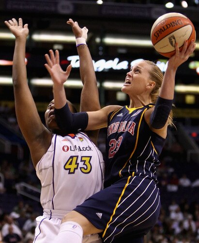 PHOENIX - SEPTEMBER 29:  Katie Douglas #23 of the Indiana Fever puts up a shot against Le'coe Willingham #43 of the Phoenix Mercury in Game One of the 2009 WNBA Finals at US Airways Center on August 29, 2009 in Phoenix, Arizona. The Mercury defeated the Fever 120-116 in overtime to take a 1-0 series lead. <br /><br /><span class="help">(Photo by Christian Petersen/Getty Images)</span>