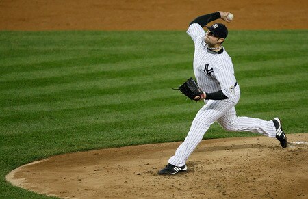 NEW YORK - SEPTEMBER 30:  Joba Chamberlain #62 of the New York Yankees pitches against the Kansas City Royals during the game on September 30, 2009 at Yankee Stadium in the Bronx borough of New York City.  <br /><br /><span class="help">(Photo by Jared Wickerham/Getty Images)</span>