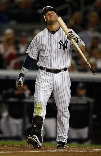 NEW YORK - SEPTEMBER 30: Nick Swisher #33 of the New York Yankees reacts after striking out against the Kansas City Royals during the game on September 30, 2009 at Yankee Stadium in the Bronx borough of New York City. <br /><br /><span class="help">(Photo by Jared Wickerham/Getty Images)</span>