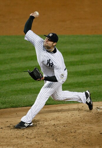 NEW YORK - SEPTEMBER 30: Joba Chamberlain #62 of the New York Yankees pitches against the Kansas City Royals during the game on September 30, 2009 at Yankee Stadium in the Bronx borough of New York City. <br /><br /><span class="help">(Photo by Jared Wickerham/Getty Images)</span>