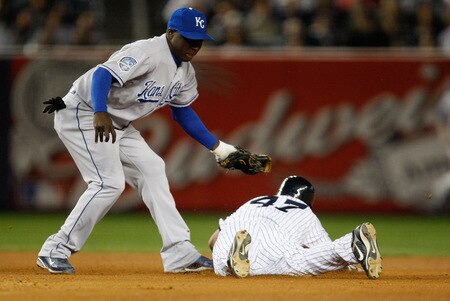 NEW YORK - SEPTEMBER 30: Yuniesky Betancourt #3 of the Kansas City Royals tags out Freddy Guzman #47 of the New York Yankees at second base during the game on September 30, 2009 at Yankee Stadium in the Bronx borough of New York City. <br /><br /><span class="help">(Photo by Jared Wickerham/Getty Images)</span>