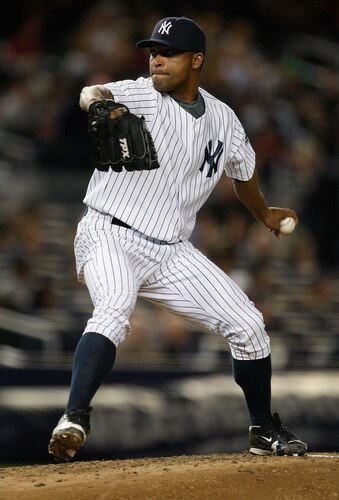 NEW YORK - SEPTEMBER 30: Damaso Marte #43 of the New York Yankees pitches against the Kansas City Royals during the game on September 30, 2009 at Yankee Stadium in the Bronx borough of New York City. <br /><br /><span class="help">(Photo by Jared Wickerham/Getty Images)</span>