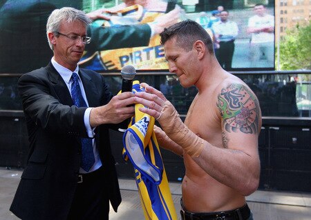 SYDNEY, AUSTRALIA - OCTOBER 01:  Boxer Danny Green is presented a Parramatta Eels jersey by NRL CEO David Gallop during a Danny Green Media Opportunity at Martin Place on October 1, 2009 in Sydney, Australia. Green will be fighting Roy Jones Jnr of the United States of Amerian for the IBO World Title on December 2, 2009. <br /><br /><span class="help">(Photo by Cameron Spencer/Getty Images)</span>