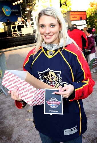 HELSINKI, FINLAND - OCTOBER 01:  Flyers promoting the games are handed out during the 2009 Compuware/NHL Premiere Fan Rally at Esplanade Park on October 1, 2009 in Helsinki, Finland. The Compuware/NHL Premiere Helsinki series will be the first regular-season NHL games ever played in Finland. The Blackhawks and Panthers will face off Friday, Oct. 2, and Saturday, Oct. 3, in Helsinki, Finland at Hartwall Areena.  <br /><br /><span class="help">(Photo by Richard Heathcote/Getty Images for the NHL)</span>