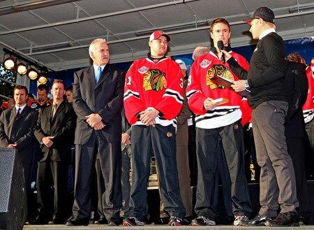HELSINKI, FINLAND - OCTOBER 01:  Chicago goalkeeper Antti Niemi (c) and Chicago captain Jonathan Toews (r) talk to the crowd during the 2009 Compuware/NHL Premiere Fan Rally at Esplanade Park on October 1, 2009 in Helsinki, Finland. The Compuware/NHL Premiere Helsinki series will be the first regular-season NHL games ever played in Finland. The Blackhawks and Panthers will face off Friday, Oct. 2, and Saturday, Oct. 3, in Helsinki, Finland at Hartwall Areena.  <br /><br /><span class="help">(Photo by Richard Heathcote/Getty Images for the NHL)</span>