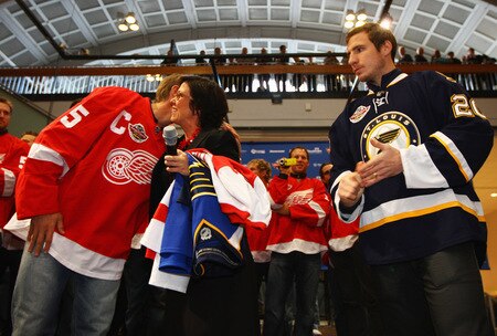 STOCKHOLM, SWEDEN - OCTOBER 01:  Nicklas Lidstrom (L) of Detroit Red Wings greets Swedish Minister of Sport Madeleine Sjostedt (C) alongside Alex Steen of St. Loius Blues (R) during the 2009 Compuware/NHL Premier Fan Rally for Detroit Red Wings and St. Loius Blues at Stockholm Central Station on October 1, 2009 in Stockholm, Sweden.  <br /><br /><span class="help">(Photo by Paul Gilham/NHLI via Getty Images)</span>