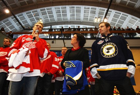 STOCKHOLM, SWEDEN - OCTOBER 01:  Nicklas Lidstrom (L) of Detroit Red Wings talks to the crowd alongside Alex Steen of St. Loius Blues (R) and Swedish Minister of Sport Madeleine Sjostedt (C) during the 2009 Compuware/NHL Premier Fan Rally for Detroit Red Wings and St. Loius Blues at Stockholm Central Station on October 1, 2009 in Stockholm, Sweden.   <br /><br /><span class="help">(Photo by Paul Gilham/NHLI via Getty Images)</span>
