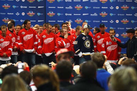 STOCKHOLM, SWEDEN - OCTOBER 01:  Henrik Zetterberg of Detroit Red Wings talks to the crowd alongside his team-mates during the 2009 Compuware/NHL Premier Fan Rally for Detroit Red Wings and St. Loius Blues at Stockholm Central Station on October 1, 2009 in Stockholm, Sweden.   <br /><br /><span class="help">(Photo by Paul Gilham/NHLI via Getty Images)</span>