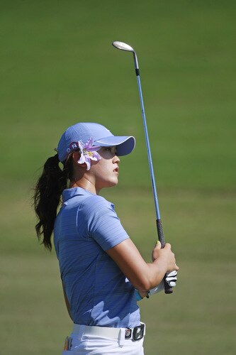 PRATTVILLE, AL - OCTOBER 1:  Michelle Wie watches her approach shot to the 18th hole during first round play in the Navistar LPGA Classic at the Robert Trent Jones Golf Trail at Capitol Hill on October 1, 2009 in  Prattville, Alabama.  <br /><br /><span class="help">(Photo by Dave Martin/Getty Images)</span>