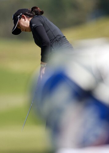 PRATTVILLE, AL - OCTOBER 1:  Joo Mi Kim of South Korea putts on the ninth green during first round play in the Navistar LPGA Classic at the Robert Trent Jones Golf Trail at Capitol Hill on October 1, 2009 in  Prattville, Alabama.  <br /><br /><span class="help">(Photo by Dave Martin/Getty Images)</span>