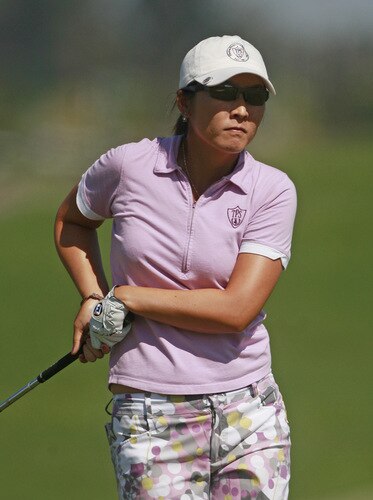 PRATTVILLE, AL - OCTOBER 1:  Candie Kung of Taiwan watches her approach shot to the 18th green during first round play in the Navistar LPGA Classic at the Robert Trent Jones Golf Trail at Capitol Hill on October 1, 2009 in  Prattville, Alabama.  <br /><br /><span class="help">(Photo by Dave Martin/Getty Images)</span>