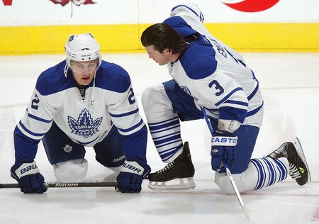 TORONTO - OCTOBER 1:  Luke Schenn #2 and Garnet Exelby #3 of the Toronto Maple Leafs talk during a warm-up prior to playing the Montreal Canadiens in the Maple Leafs home opener on October 1, 2009 at the Air Canada Centre in Toronto, Ontario, Canada.  <br /><br /><span class="help">(Photo by Claus Andersen/Getty Images)</span>