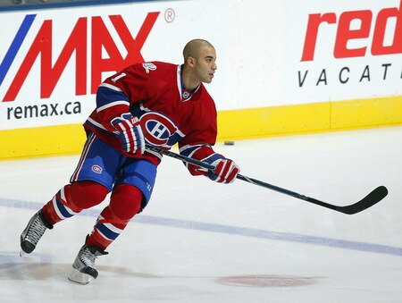 TORONTO - OCTOBER 1:  Scott Gomez #91 of the Montreal Canadiens skates in the warm-up prior to playing the Toronto Maple Leafs in the Maple Leafs home opener on October 1, 2009 at the Air Canada Centre in Toronto, Ontario, Canada.  <br /><br /><span class="help">(Photo by Claus Andersen/Getty Images)</span>