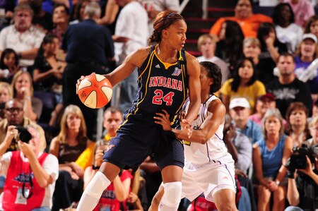 PHOENIX - OCTOBER 1: Tamika Catchings #24 of the Indiana Fever is guarded by Temeka Johnson #2 of the Phoenix Mercury in Game Two of the WNBA Finals on October 1, 2009 at U.S. Airways Center in Phoenix, Arizona. <br /><br /><span class="help">(Photo by Barry Gossage/NBAE via Getty Images)</span>