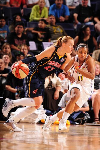 PHOENIX - OCTOBER 1: Katie Douglas #23 of the Indiana Fever drives against Ketia Swanier #11 of the Phoenix Mercury in Game Two of the WNBA Finals on October 1, 2009 at U.S. Airways Center in Phoenix, Arizona. <br /><br /><span class="help">(Photo by Barry Gossage/NBAE via Getty Images)</span>
