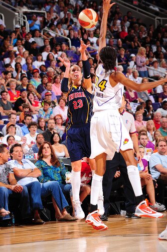 PHOENIX - OCTOBER 1: Katie Douglas #23 of the Indiana Fever puts a shot up over Dawanna Bonner #24 of the Phoenix Mercury in Game Two of the WNBA Finals on October 1, 2009 at U.S. Airways Center in Phoenix, Arizona. <br /><br /><span class="help">(Photo by P. A. Molumby/NBAE via Getty Images)</span>