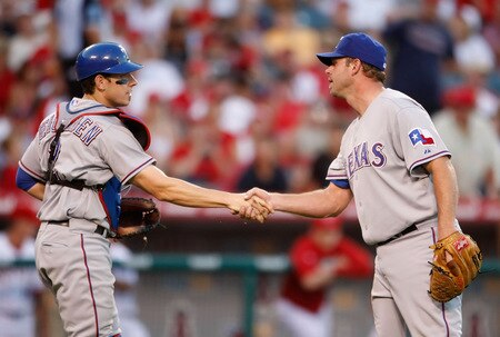 ANAHEIM, CA - OCTOBER 01:  Taylor Teagarden (L) #2 and Kevin Millwood #33 of the Texas Rangers congratulate one another following their victory over the Los Angeles Angels of Anaheim at Angel Stadium on October 1, 2009 in Anaheim, California. The Rangers defeated the Angels 11-3.  <br /><br /><span class="help">(Photo by Jeff Gross/Getty Images)</span>