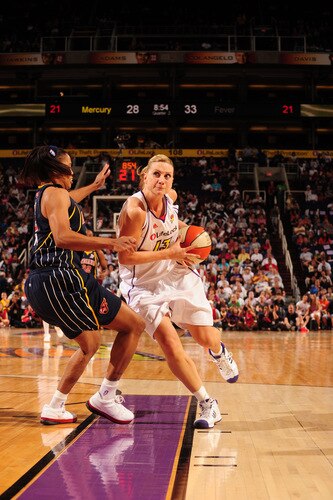 PHOENIX - OCTOBER 1: Penny Taylor #13 of the Phoenix Mercury drives against Briann January #20 of the Indiana Fever in Game Two of the WNBA Finals on October 1, 2009 at U.S. Airways Center in Phoenix, Arizona. <br /><br /><span class="help">(Photo by Barry Gossage/NBAE via Getty Images)</span>