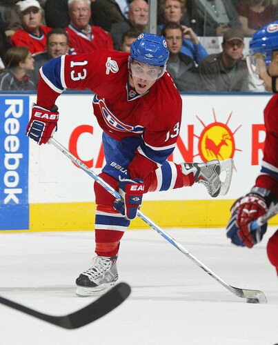 TORONTO - OCTOBER 1:  Mike Cammallari #13 of the Montreal Canadiens fires a shot in a game against the Toronto Maple Leafs in the Maple Leafs' home opener October 1, 2009 at the Air Canada Centre in Toronto, Ontario. The Canadiens defeated the Leafs 4-3 in overtime. <br /><br /><span class="help">(Photo by Claus Andersen/Getty Images)</span>