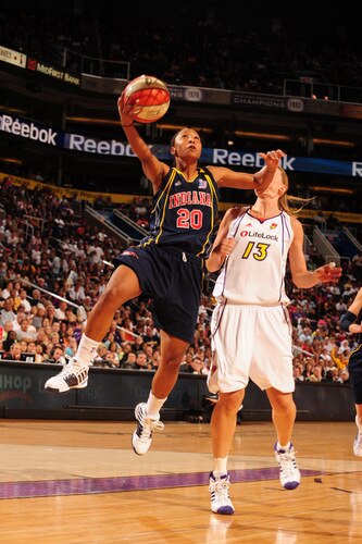 PHOENIX - OCTOBER 1: Briann January #20 of the Indiana Fever drives for a shot around Penny Taylor #13 of the Phoenix Mercury in Game Two of the WNBA Finals on October 1, 2009 at U.S. Airways Center in Phoenix, Arizona. <br /><br /><span class="help">(Photo by Barry Gossage/NBAE via Getty Images)</span>