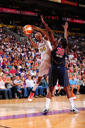 PHOENIX - OCTOBER 1: Dawanna Bonner #24 of the Phoenix Mercury puts a shot up around the block of Ebony Hoffman #32 of the Indiana Fever in Game Two of the WNBA Finals on October 1, 2009 at U.S. Airways Center in Phoenix, Arizona. <br /><br /><span class="help">(Photo by P. A. Molumby/NBAE via Getty Images)</span>