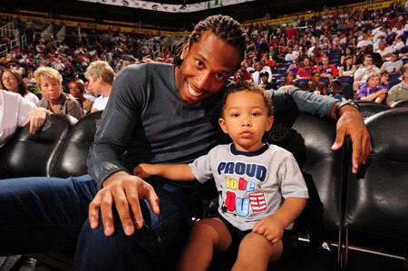 PHOENIX - OCTOBER 1: Larry Fitzgerald, wide receiver of the Arizona Cardinals, watches courtside as the Phoenix Mercury host the Indiana Fever in Game two of the WNBA Finals played on October 1, 2009 at U.S. Airways Center in Phoenix, Arizona. <br /><br /><span class="help">(Photo by Barry Gossage/NBAE via Getty Images)</span>