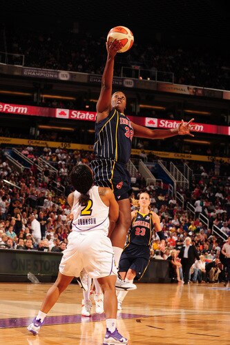 PHOENIX - OCTOBER 1: Ebony Hoffman #32 of the Indiana Fever drives for a shot against Temeka Johnson #2 of the Phoenix Mercury in Game Two of the WNBA Finals on October 1, 2009 at U.S. Airways Center in Phoenix, Arizona. <br /><br /><span class="help">(Photo by Barry Gossage/NBAE via Getty Images)</span>