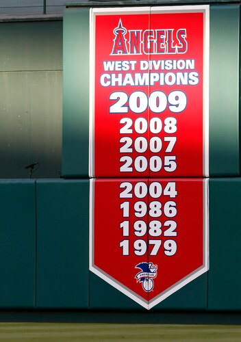 ANAHEIM, CA - OCTOBER 01:  A banner in center field announces the 2009 West Division Champion Los Angeles Angels of Anaheim during the game against the Texas Rangers at Angel Stadium on October 1, 2009 in Anaheim, California. The Rangers defeated the Angels 11-3.  <br /><br /><span class="help">(Photo by Jeff Gross/Getty Images)</span>
