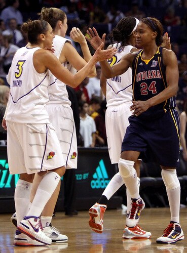 PHOENIX - OCTOBER 01:  Tamika Catchings #24 of the Indiana Fever high fives Diana Taurasi #3 of the Phoenix Mercury following Game Two of the 2009 WNBA Finals at US Airways Center on October 1, 2009 in Phoenix, Arizona. The Fever defeated the Mercury 94-83 to tie the series at 1-1.  <br /><br /><span class="help">(Photo by Christian Petersen/Getty Images)</span>