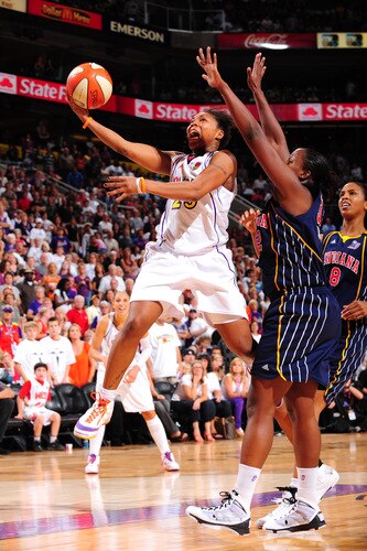 PHOENIX - OCTOBER 1: Cappie Pondexter #23 of the Phoenix Mercury drives for a shot past Ebony Hoffman #32 of the Indiana Fever in Game two of the WNBA Finals played on October 1, 2009 at U.S. Airways Center in Phoenix, Arizona. <br /><br /><span class="help">(Photo by P. A. Molumby/NBAE via Getty Images)</span>