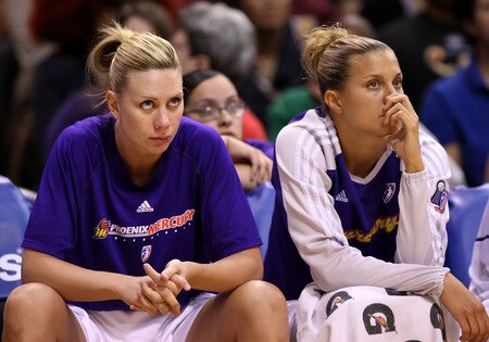 PHOENIX - OCTOBER 01:  Penny Taylor #13 and Kelly Mazzante #33 of the Phoenix Mercury watch from the bench in the final moments of Game Two of the 2009 WNBA Finals against the Indiana Fever at US Airways Center on October 1, 2009 in Phoenix, Arizona. The Fever defeated the Mercury 94-83 to tie the series at 1-1.  <br /><br /><span class="help">(Photo by Christian Petersen/Getty Images)</span>